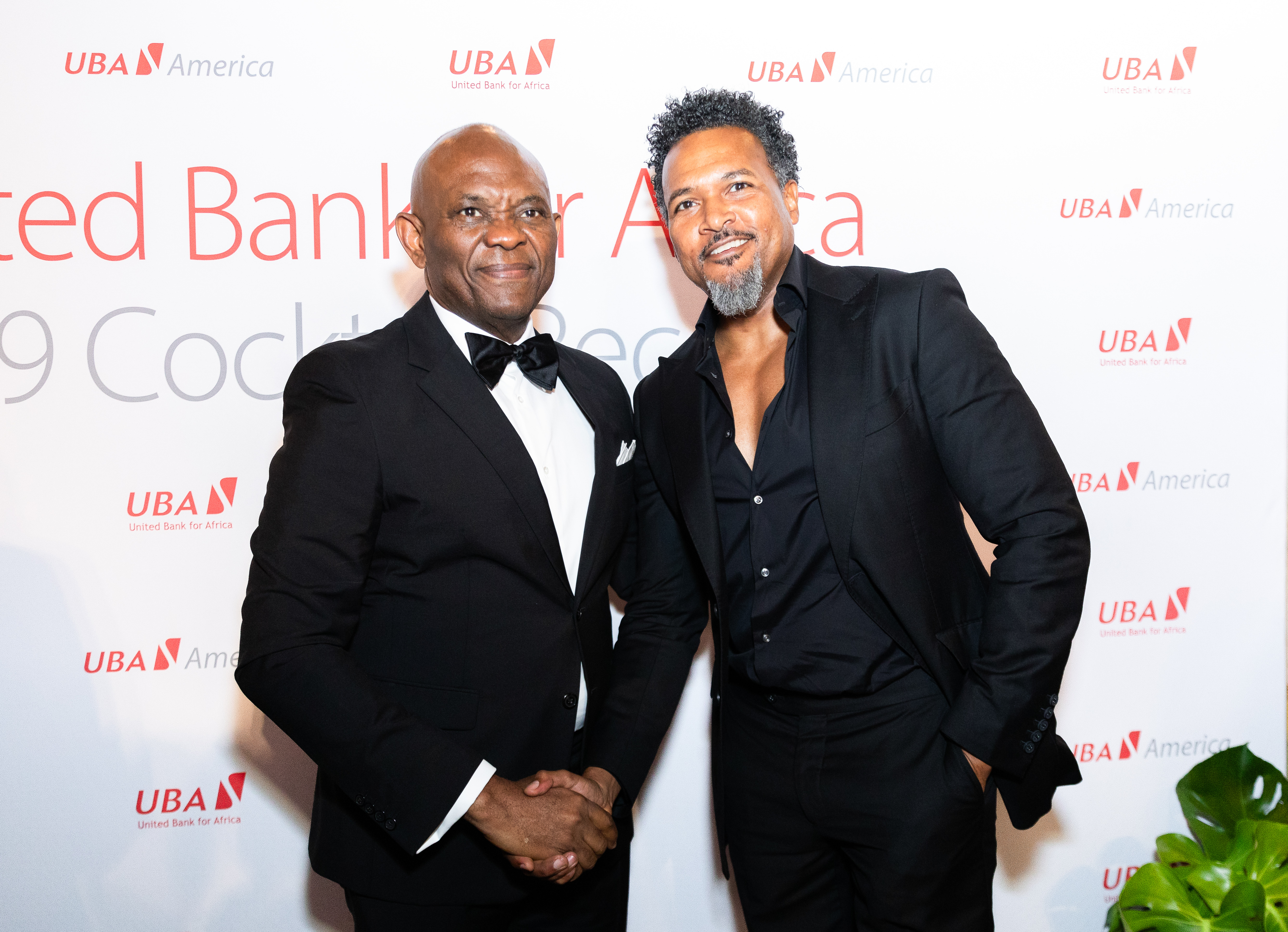 Two guests at a UBA America gala